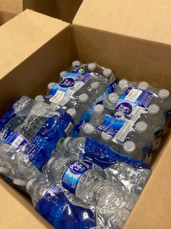 Photo 1 of ***4 PACK OF WATER **** Pure Life Purified Water Bottles, 4 12 Pack - Still Bottled Water Enhanced with Minerals for a Crisp Taste, Plastic Bottles - 16.9 Fl oz