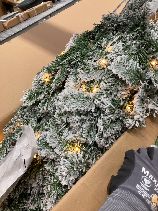 Photo 1 of *Cord issues?* IZNEN 7.5ft Pre-Lit Snowflake Flocked Christmas Tree,8 Modes LED Lights,Artificial Xmas Tree with Storage Bag, Green Flocked Tree