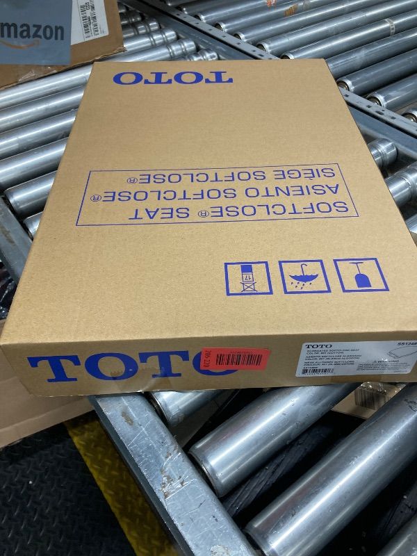 Photo 1 of ***Factory seal***

TOTO SoftClose Slow Close Elongated Toilet Seat and Lid, Cotton White - SS124#01