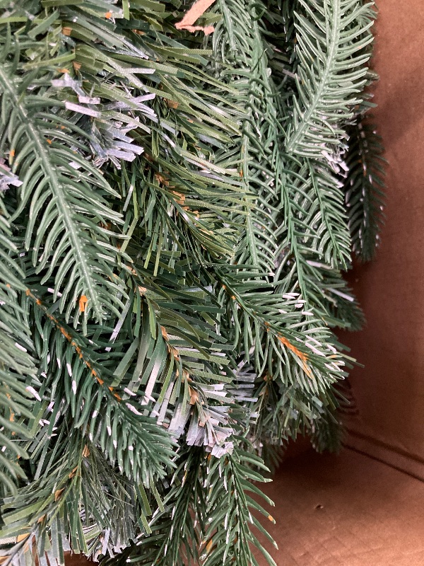 Photo 1 of ***THE STAND APPEARS TO BE MISSING***7' ARTIFICIAL CHRISTMAS TREE.***THE STAND APPEARS TO BE MISSING***