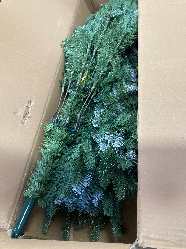 Photo 1 of ***THE STAND APPEARS TO BE MISSING***7' ARTIFICIAL CHRISTMAS TREE.***THE STAND APPEARS TO BE MISSING***