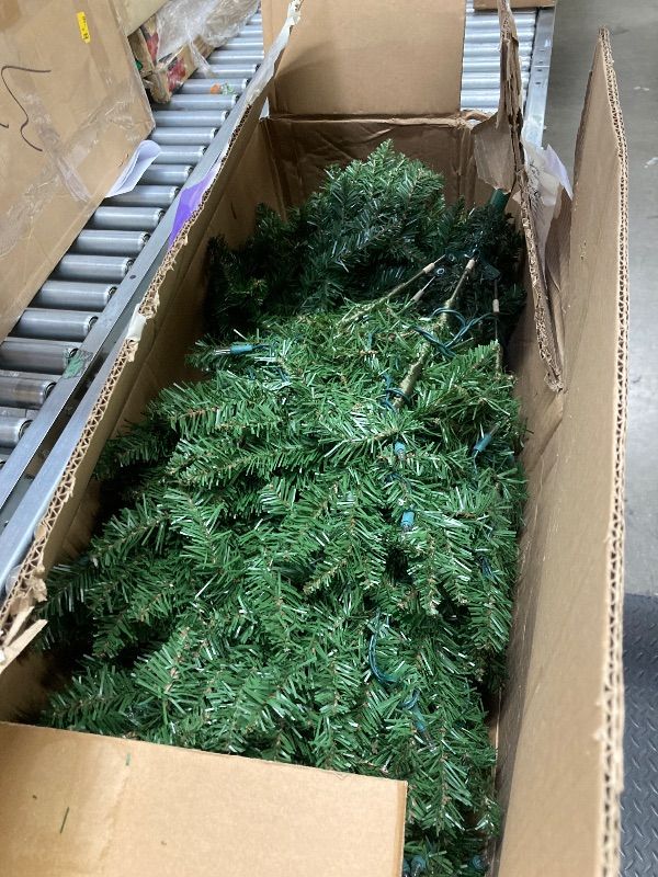 Photo 1 of ***LIGHTS DO NOT WORK***NATIONAL TREE COMPANY 4.5 FT PRE-LIT NORTH VALLEY SPRUCE ARTIFICIAL CHRISTMAS TREE, 200 CLEAR LIGHTS, 398 TIPS, INCLUDES STAND, GREEN***LIGHTS DO NOT WORK***