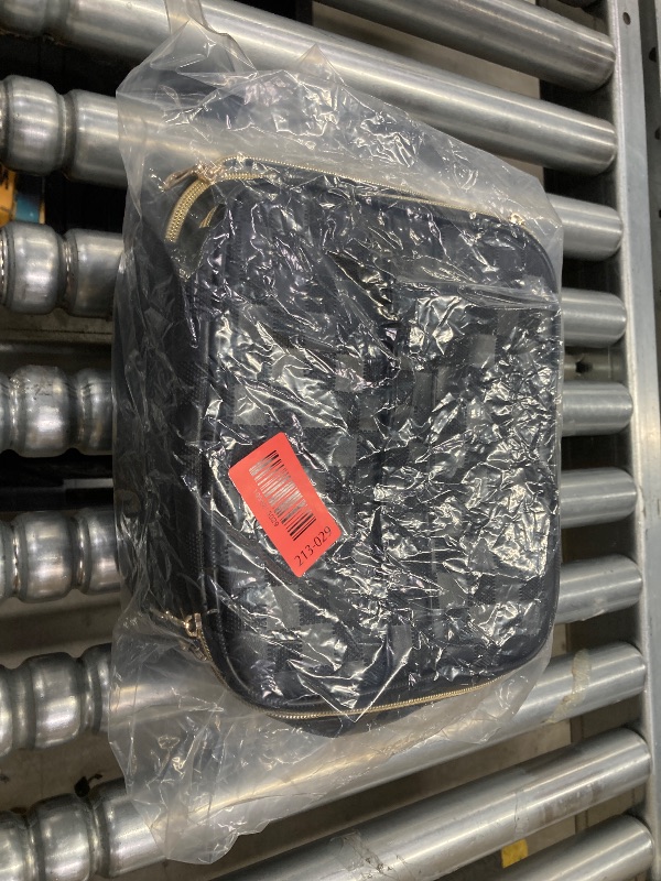 Photo 1 of ***THERE IS A LITTLE BIT OF STICKY TAPE RESIDUE ON OUTER BAG AS PICTURED.***PORTABLE NAIL POLISH ORGANIZER BAG WITH UV LIGHT CASE. HOLDS 30 BOTTLES AND 1 UV NAIL LAMP. CHECKERED BLACK***THERE IS A LITTLE BIT OF STICKY TAPE RESIDUE ON OUTER BAG AS PICTURED