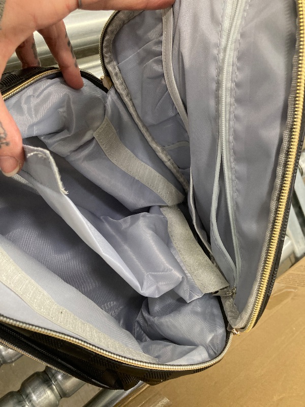 Photo 1 of ***THERE IS A LITTLE BIT OF STICKY TAPE RESIDUE ON OUTER BAG AS PICTURED.***PORTABLE NAIL POLISH ORGANIZER BAG WITH UV LIGHT CASE. HOLDS 30 BOTTLES AND 1 UV NAIL LAMP. CHECKERED BLACK***THERE IS A LITTLE BIT OF STICKY TAPE RESIDUE ON OUTER BAG AS PICTURED