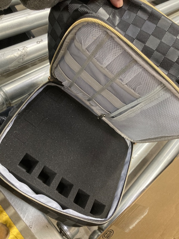 Photo 1 of ***THERE IS A LITTLE BIT OF STICKY TAPE RESIDUE ON OUTER BAG AS PICTURED.***PORTABLE NAIL POLISH ORGANIZER BAG WITH UV LIGHT CASE. HOLDS 30 BOTTLES AND 1 UV NAIL LAMP. CHECKERED BLACK***THERE IS A LITTLE BIT OF STICKY TAPE RESIDUE ON OUTER BAG AS PICTURED