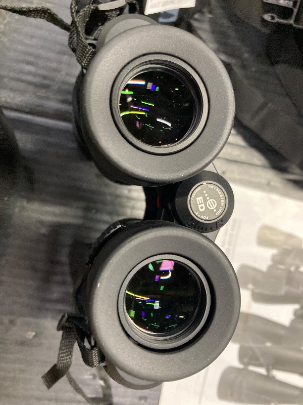 View 4 of ***EYE COVER HAS A SMALL TEAR* REFER TO PICTURE***Celestron – SkyMaster Pro ED 7x50 Binocular – Astronomy Binocular with ED Glass – Large Aperture for Long Distance Viewing – Fully Multi-Coated XLT Coating – Tripod Adapter and Carrying Case Included***EYE