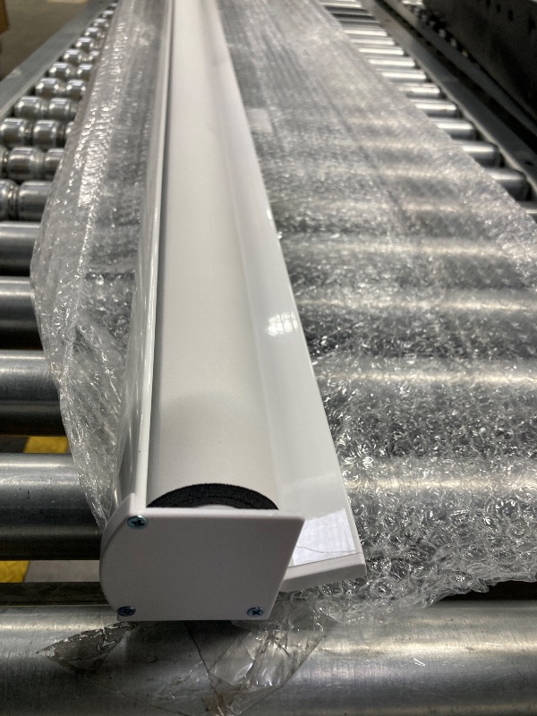 Photo 1 of ***NOT SURE WHAT THIS IS BUT IT LOOKS LIKE A PROJECTOR SCREEN**64" WIDE**LENGTH UNKNOWN*PLEASE REFER TO PICTURES***