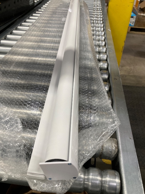 Photo 1 of ***NOT SURE WHAT THIS IS BUT IT LOOKS LIKE A PROJECTOR SCREEN**64" WIDE**LENGTH UNKNOWN*PLEASE REFER TO PICTURES***