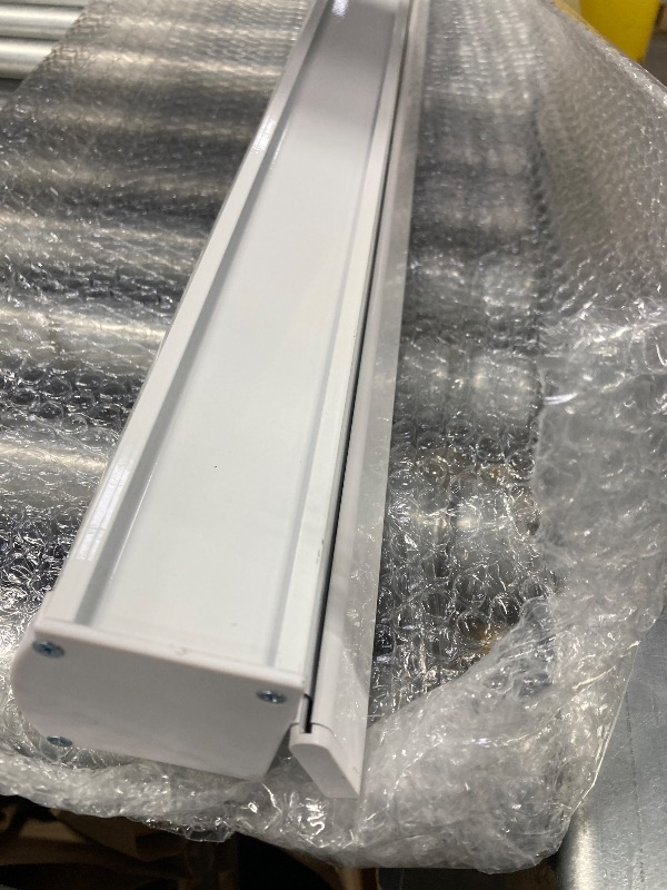 Photo 1 of ***NOT SURE WHAT THIS IS BUT IT LOOKS LIKE A PROJECTOR SCREEN**64" WIDE**LENGTH UNKNOWN*PLEASE REFER TO PICTURES***