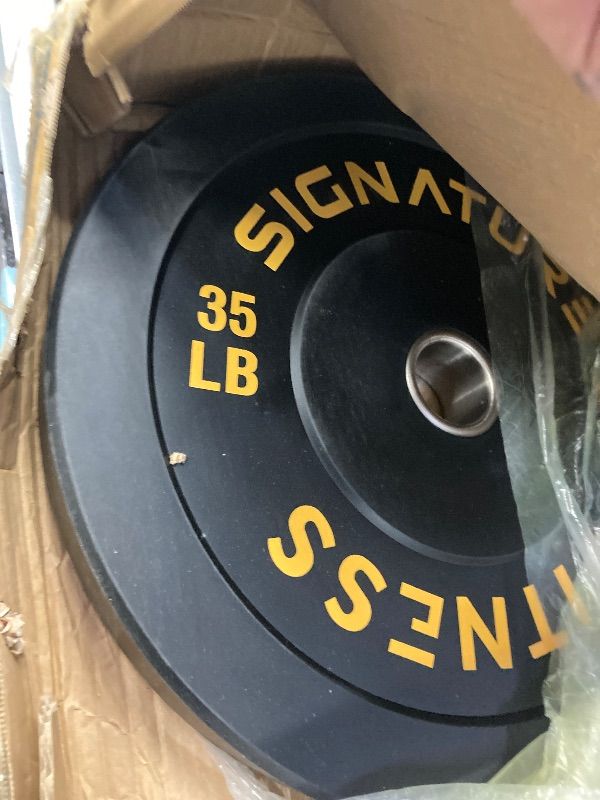 Photo 1 of **ONLY 1  WEIGHT PLATE INCLUDED***Signature Fitness 2-Inch 35LB WEIGHT PLATE. **ONLY 1  WEIGHT PLATE INCLUDED**