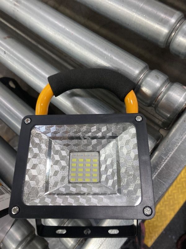 Photo 1 of **BATTERY COVER WONT STAY CLOSED**PORTABLE LIGHT