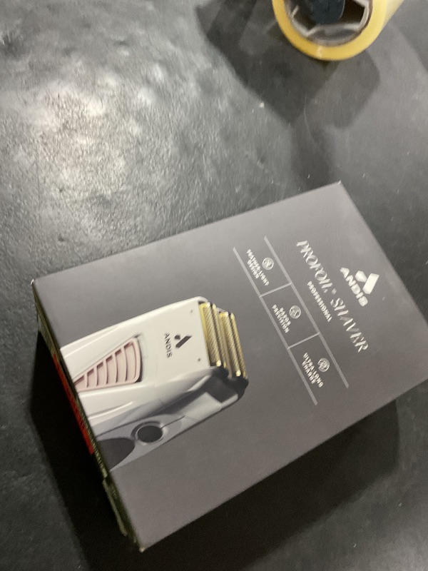 Photo 1 of Andis TS-1 17235 Pro Foil Lithium Titanium Foil Shaver, Cord/Cordless, Smooth Shaving Cordless Shaver with Charger, Gray