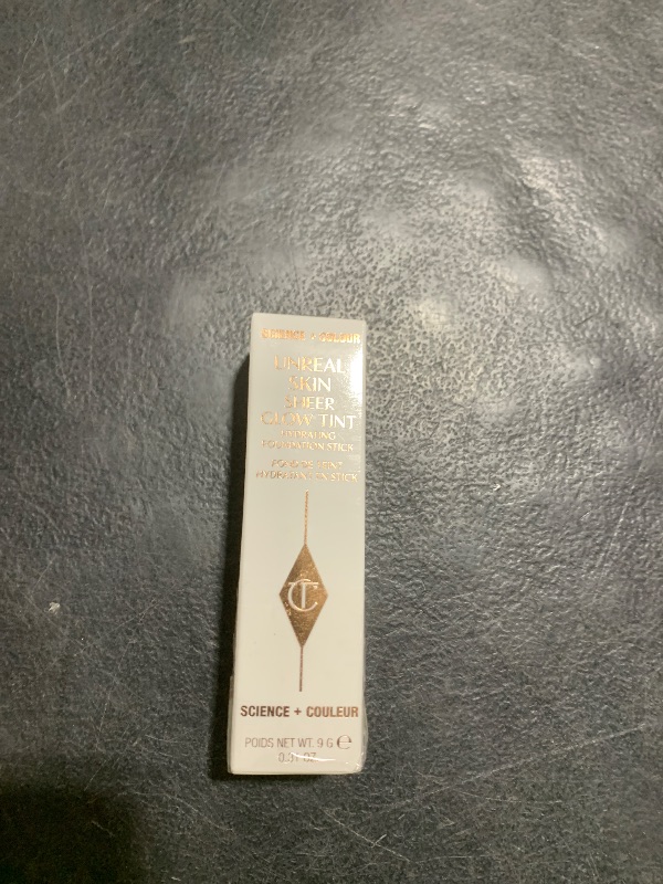 Photo 1 of Charlotte Tilbury Unreal Skin Tint & Sheer Glow Hydrating Foundation Stick - Cream Foundation Makeup with Sheer-to-Light Coverage & a Buildable Formula - Blurring, Smoothing & Nourishing - 1.5 Fair