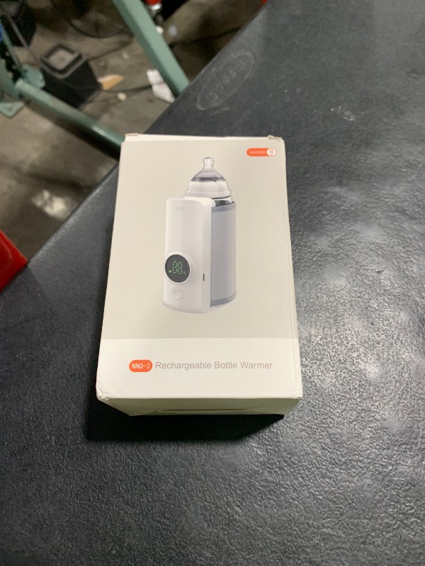 Photo 1 of Portable Bottle Warmer for Travel, Fast Warming Comfortable Baby Feeding On The Go, Waterless Milk Warming with Battery-Powered for Home Outdoor