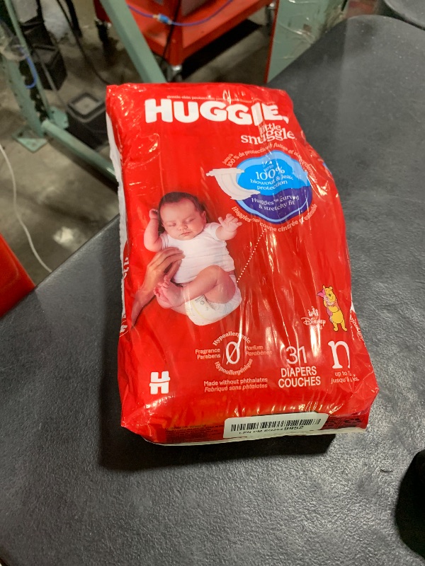 Photo 1 of Huggies Size Newborn Diapers, Little Snugglers Baby Diapers, Size Newborn (up to 10 lbs), 31 Count, Packaging May Vary