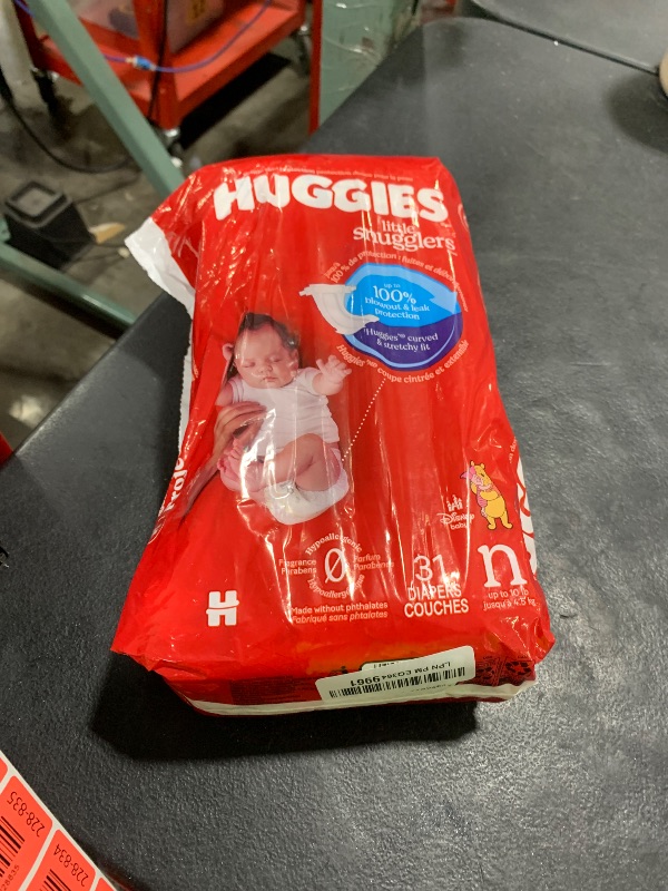 Photo 1 of Huggies Size Newborn Diapers, Little Snugglers Baby Diapers, Size Newborn (up to 10 lbs), 31 Count, Packaging May Vary