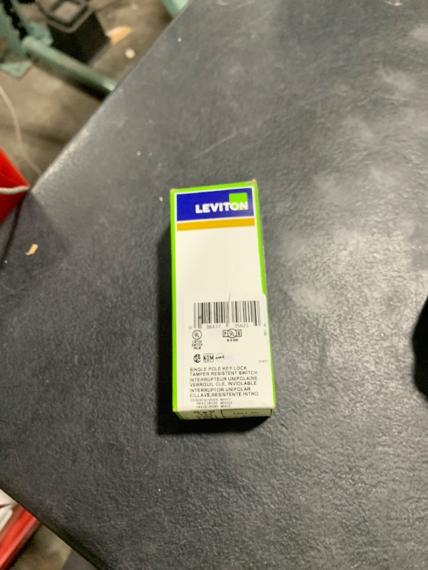 Photo 1 of Leviton 15 Amp, 120/277 Volt, Toggle Locking Single-Pole AC Quiet Switch, Extra Heavy Duty Grade, Self Grounding, 1201-2IL, Ivory