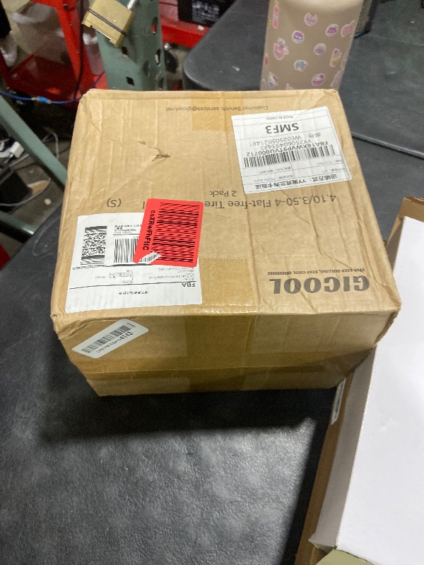 Photo 1 of GICOOL 4.10/3.50-4" Flat Free Tire and Wheel, 10" Solid Tire with 5/8" Axle Bore Hole, 2.2" Offset Hub for Hand Truck Garden Wagon Cart Trolley Dolly Lawn Mover Replacement