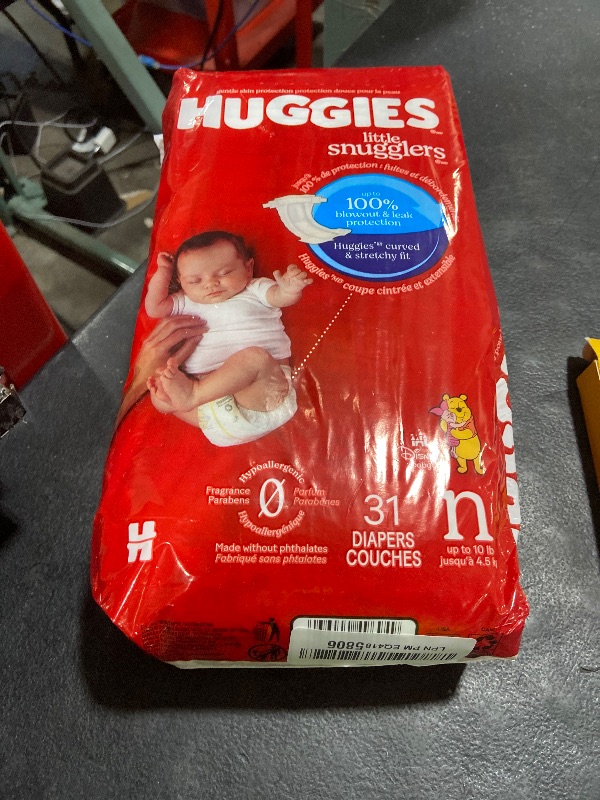 Photo 1 of Huggies Size Newborn Diapers, Little Snugglers Baby Diapers, Size Newborn (up to 10 lbs), 31 Count, Packaging May Vary