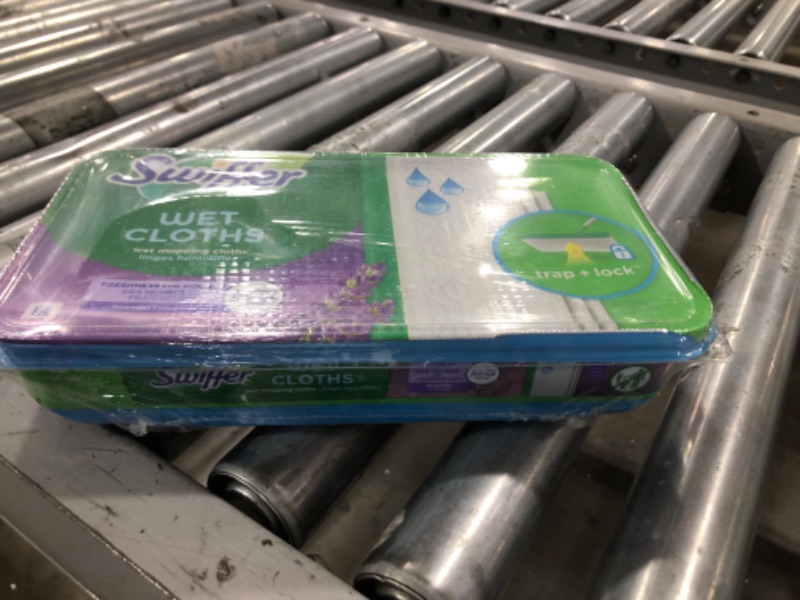 Photo 1 of Swiffer Sweeper Wet Mopping Pad Refills for Floor Mop with Febreze Lavender Scent, 12 Count (Packaging May Vary)