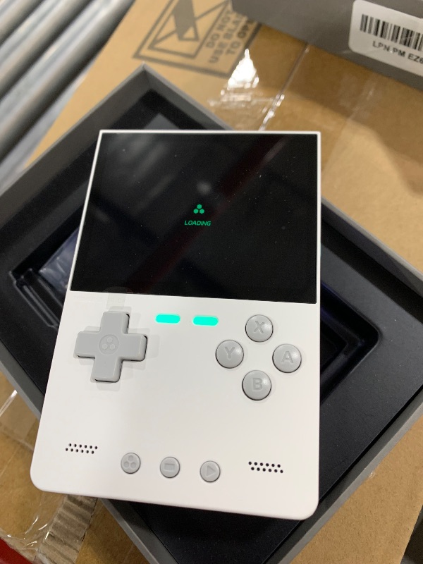 Photo 1 of Trimui Brick Retro Game Console Portable Retro Gaming WiFi Multiplayer 3.2-inch 1024*768 IPS Screen 3000mAh Built-in 64G TF Card Linux Retro Handheld White
