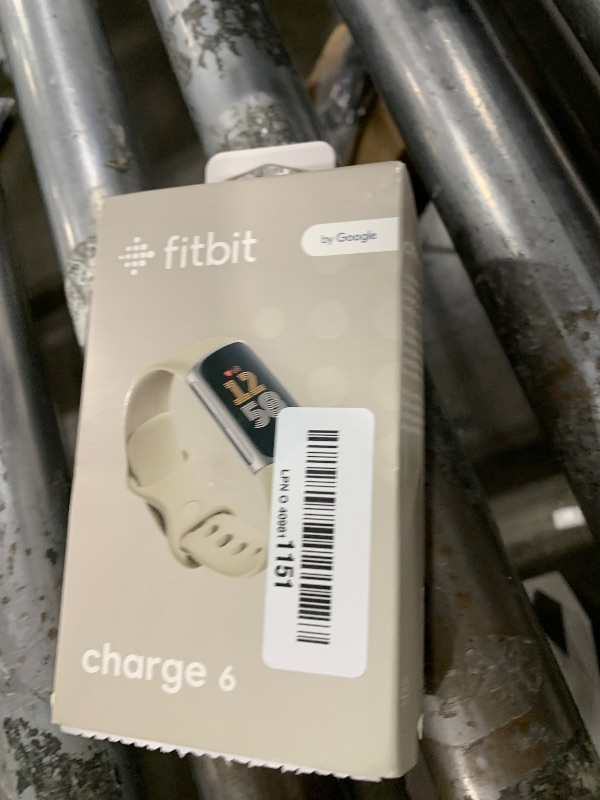 Photo 1 of Fitbit Charge 6 Fitness Tracker with Google apps, Heart Rate on Exercise Equipment, 6-Months Premium Membership Included, GPS, Health Tools and More, Porcelain/Silver, One Size (S & L Bands Included)