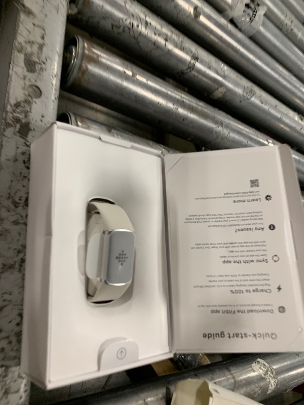 Photo 1 of Fitbit Charge 6 Fitness Tracker with Google apps, Heart Rate on Exercise Equipment, 6-Months Premium Membership Included, GPS, Health Tools and More, Porcelain/Silver, One Size (S & L Bands Included)