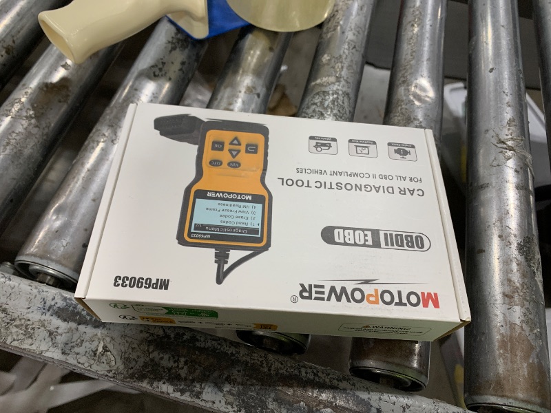Photo 1 of MOTOPOWER MP69033 Car OBD2 Scanner Code Reader Engine Fault Scanner CAN Diagnostic Scan Tool for All OBD II Protocol Cars Since 1996, Yellow
