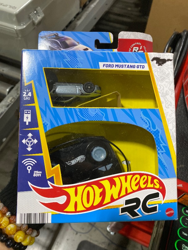 Photo 1 of Hot Wheels RC Toy Car, Full-Function Remote-Control 1:64 Scale Ford Mustang, Booster Button to Race & Stunt On- or Off-Track, Recharge with USB Cable