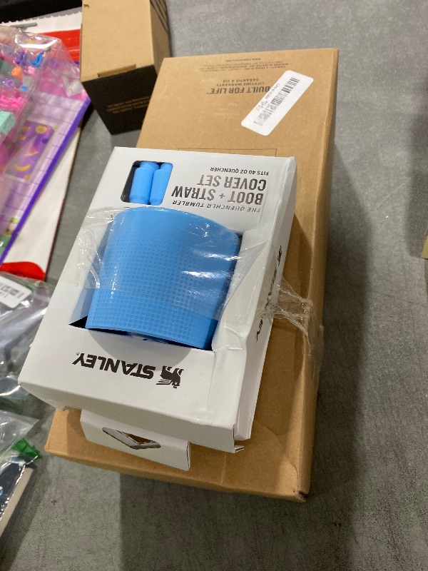 Photo 1 of STANLEY Quencher H2.0 Tumbler with Handle and Straw 40 oz | Flowstate 3-Position Lid | Cup Holder Compatible for Travel | Insulated Stainless Steel Cup | BPA-Free | Cornflower Gloss