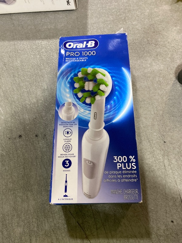 Photo 1 of Oral-B Pro 1000 Rechargeable Electric Toothbrush, White