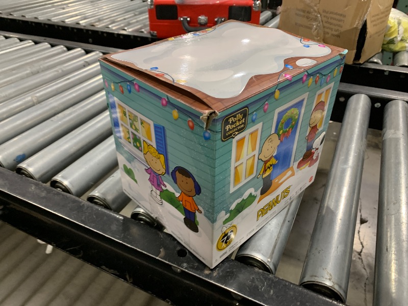 Photo 1 of Polly Pocket x Peanuts Collector Compact, Micro Dolls and Playset, 7 Themed Accessories, 4 Iconic Locations, Snoopy & Woodstock