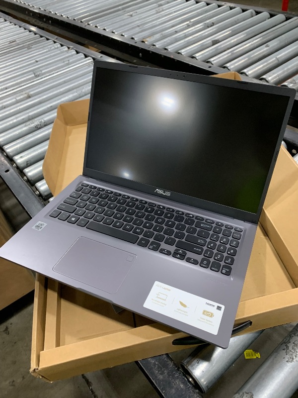 Photo 1 of ASUS VivoBook 15 F515 Thin and Light Laptop, 15.6” FHD Display, Intel Core i3-1005G1 Processor, 4GB DDR4 RAM, 128GB PCIe SSD, Fingerprint Reader, Windows 10 Home in S Mode, Slate Grey, F515JA-AH31