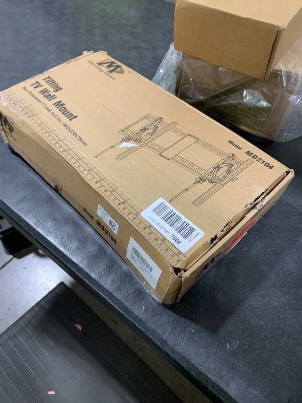 Photo 1 of Mounting Dream UL Listed Advanced Tilt TV Wall Mount for Most 42-90 Inch TVs, TV Bracket with Full Tilt Extension up to 7", Fits 16", 18", 24" Studs, Max VESA 600x400mm and 120LBS MD2104