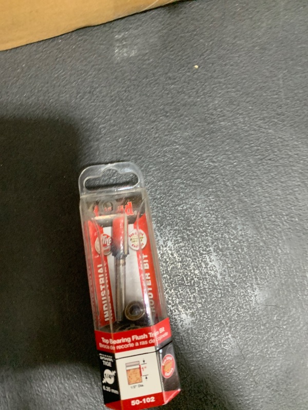 Photo 1 of Freud 1/2" Top Bearing Flush Trim Router Bit with Tico Hi-Density Carbide for Maximum Performance - Ideal for Template & Pattern Routing, 1/2" Diameter, 1/4" Shank, 1" Height, 2 Cutters - 50-102
