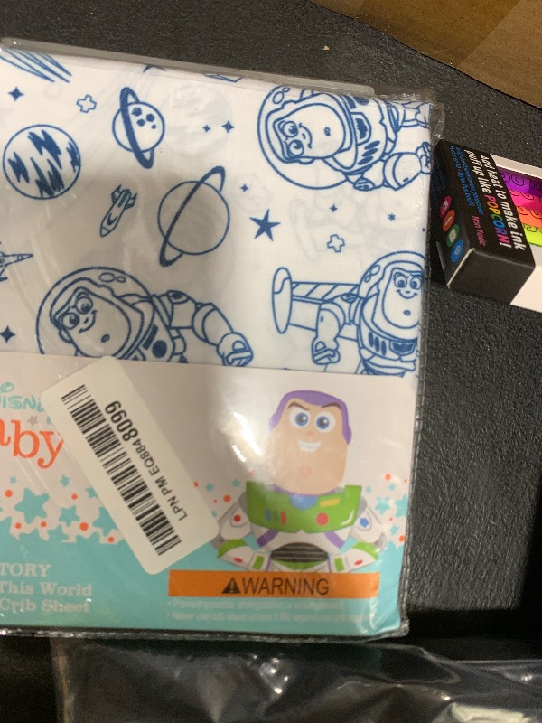 Photo 1 of Disney Toy Story Outta This World Blue and White Fitted Crib Sheet