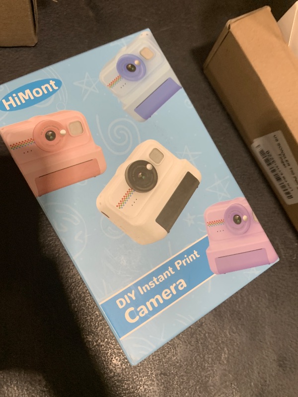 Photo 1 of HiMont Kids Instant Print Camera, 1080P HD Kids Camera Instant Print with 3 Rolls Print Paper & 32GB Card, Ideal Kids Toys Gifts for Boys & Girls Age 3-14 (Black)