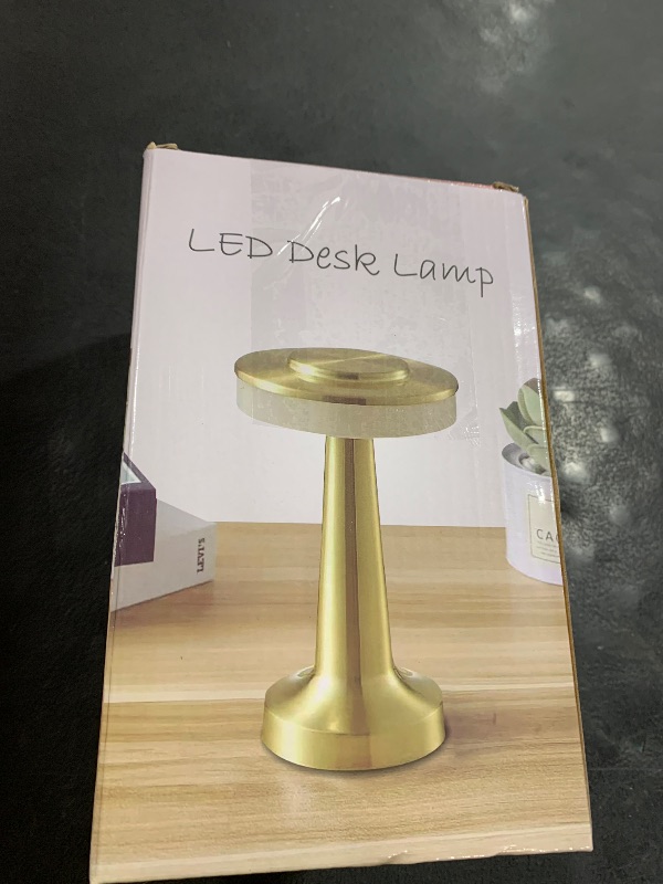 Photo 1 of JHPGEOE Cordless Metal Desk Lamp, Touch Sensor Control LED Table Lamp,3 Color Stepless Dimmable Battery Powered Lamp for Living Room, Dorm, Home Office (Gold)