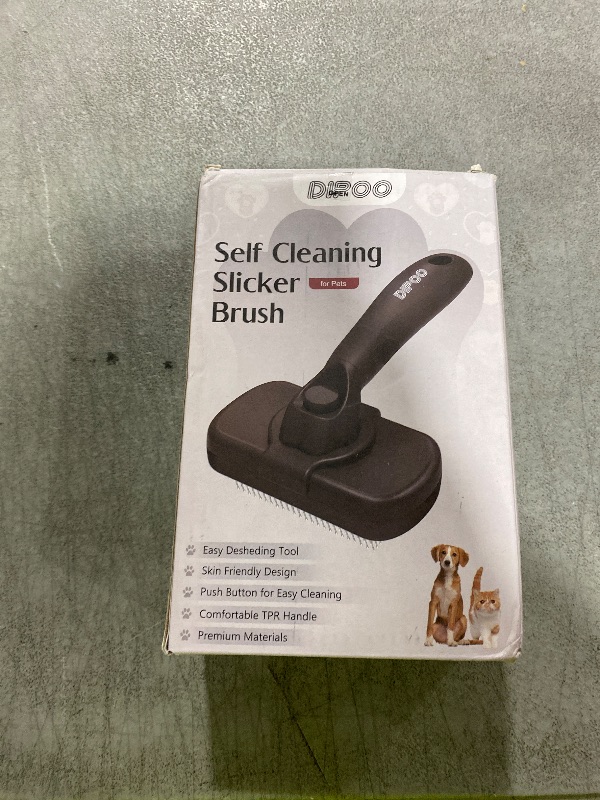 Photo 1 of Dipoo Self Cleaning Shedding Brush - Skin Friendly Grooming Tool for Dogs, Cats, and Puppies, Deshedding and Hair Removal for Long and Short Haired Pets, Black