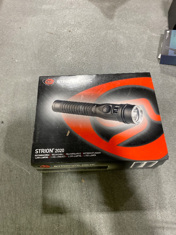 Photo 1 of Streamlight 74431 Strion 2020 1200-Lumen Rechargeable LED Flashlight Includes 120V/100V AC/12V DC Charging System and Holder, Black