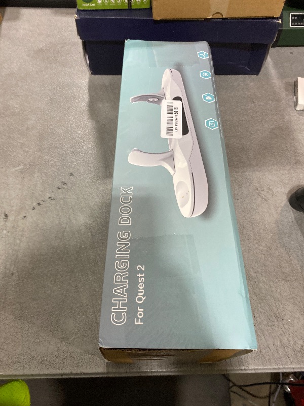 Photo 1 of Charging Dock for Meta Quest 2, Dxldfks Auto-Clamping Docking Station for Oculus Quest 2 with LED Light Display, 2 Rechargeable Batteries, 2 Controller Battery Cover and USB-C Charger