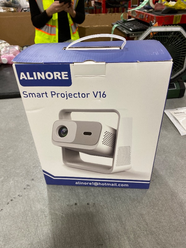 Photo 1 of ALINORE Smart Projector with WiFi and Bluetooth, Built-in Apps, Electric Focus & Auto Keystone Portable Outdoor Projecor, Native 1080P Projector 4K Support, Movie Projector for Home Theater (White)