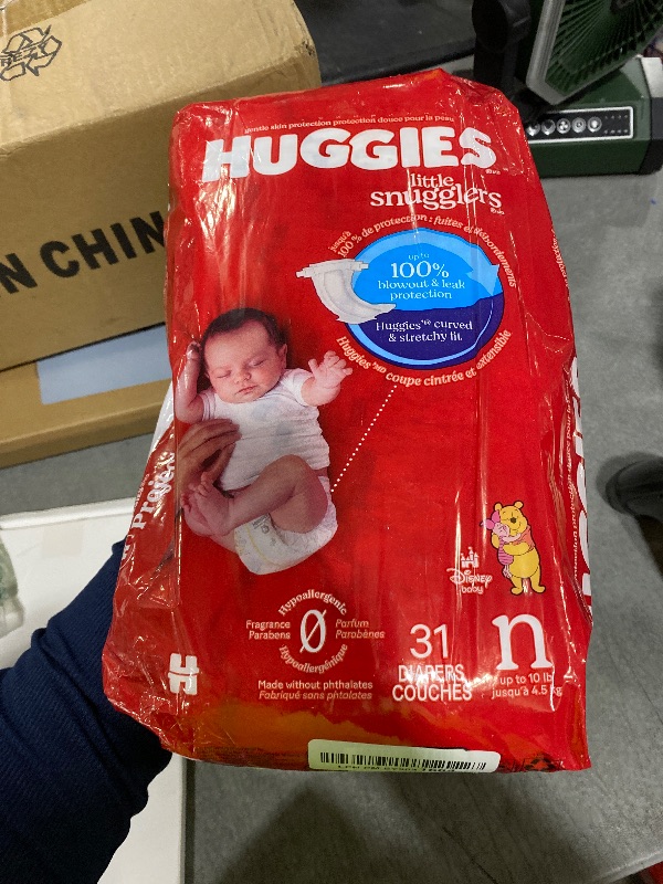 Photo 1 of Huggies Size Newborn Diapers, Little Snugglers Baby Diapers, Size Newborn (up to 10 lbs), 31 Count, Packaging May Vary