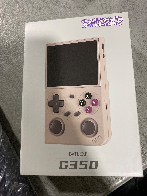 Photo 1 of G350 Handheld Game Console , 3.5 Inch IPS Screen Linux System 3200 mAh Battery 4371 Games Preloaded , Portable Retro Video Games Console Support Wired Controller and Earphone (Transparent Black)