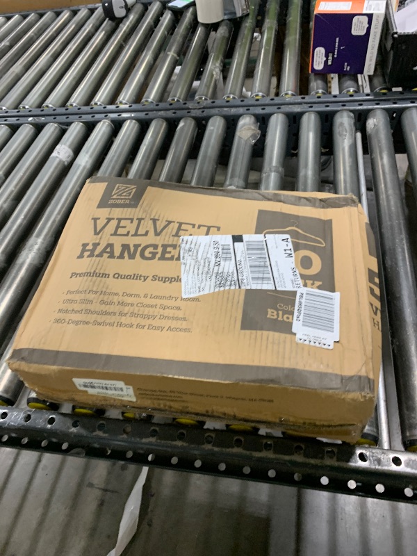 Photo 1 of Zober Velvet Hangers 50 Pack - Black for Coats, Pants & Dress Clothes - Non Slip w/ 360 Degree Swivel, Holds up to 10 lbs - Strong Felt Hangers for Clothing