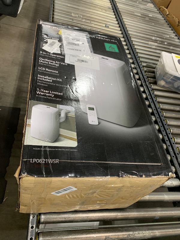 Photo 1 of LG 6,000 BTU Portable Air Conditioner, 115V, Cools 250 Sq.Ft. (10' x 25' Room Size), Portable Air Conditioner for Home with Quiet Operation, LCD Remote Control, and Window Installation Kit, White