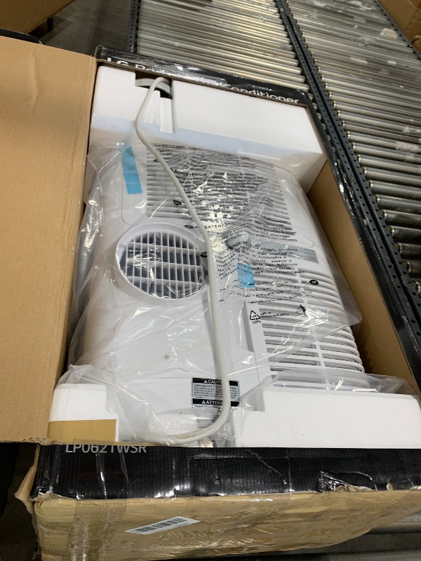Photo 1 of LG 6,000 BTU Portable Air Conditioner, 115V, Cools 250 Sq.Ft. (10' x 25' Room Size), Portable Air Conditioner for Home with Quiet Operation, LCD Remote Control, and Window Installation Kit, White