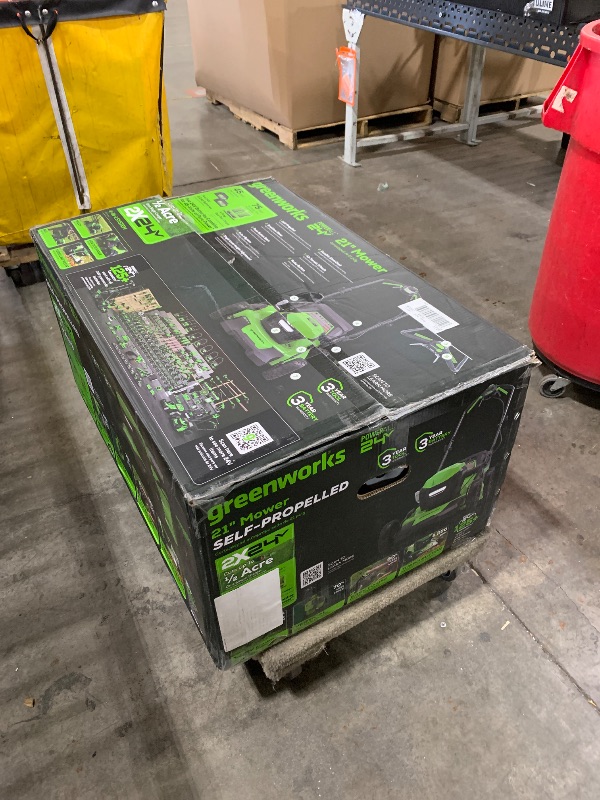 Photo 1 of Greenworks 48V (2 x 24V) 21" Brushless Cordless (Self-Propelled) Lawn Mower (LED Headlight), (2) 5.0Ah Batteries and Dual Port Rapid Charger Included (125+ Compatible Tools)