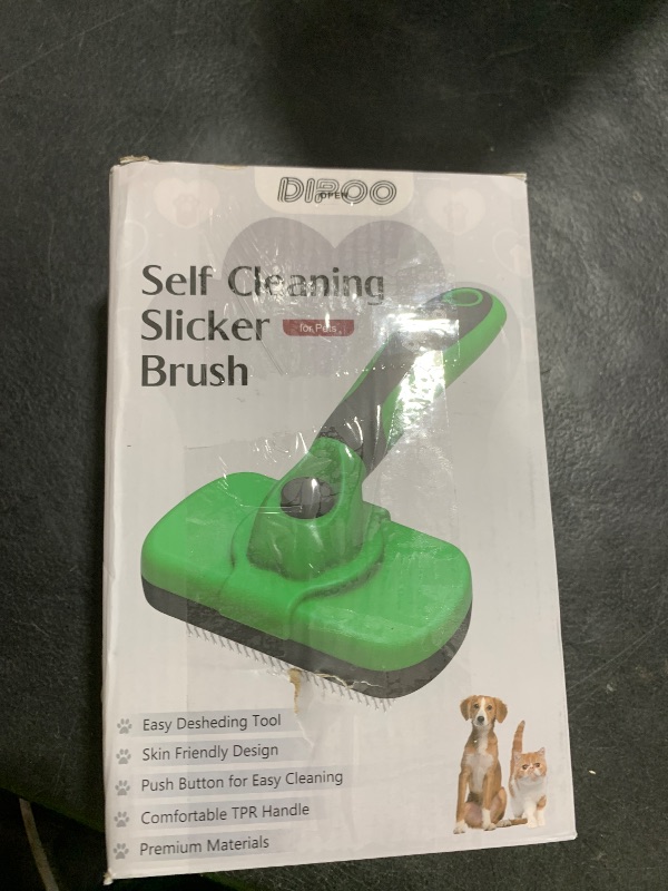 Photo 1 of Dipoo Self Cleaning Deshedding Brush for Dogs & Cats - Skin Friendly Grooming Tool with Hair Removal for Haired Pets, Green