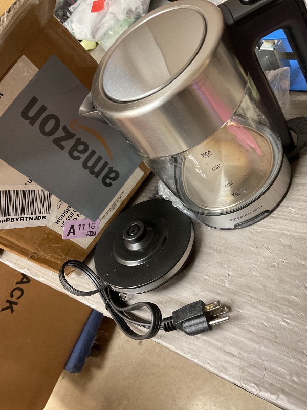 Photo 1 of Amazon Basics Electric Kettle with Glass Carafe for Tea and Coffee, BPA-Free, Fast Boiling, Auto Shut-Off, 1.1 Quarts, 1500W, Glass and Steel